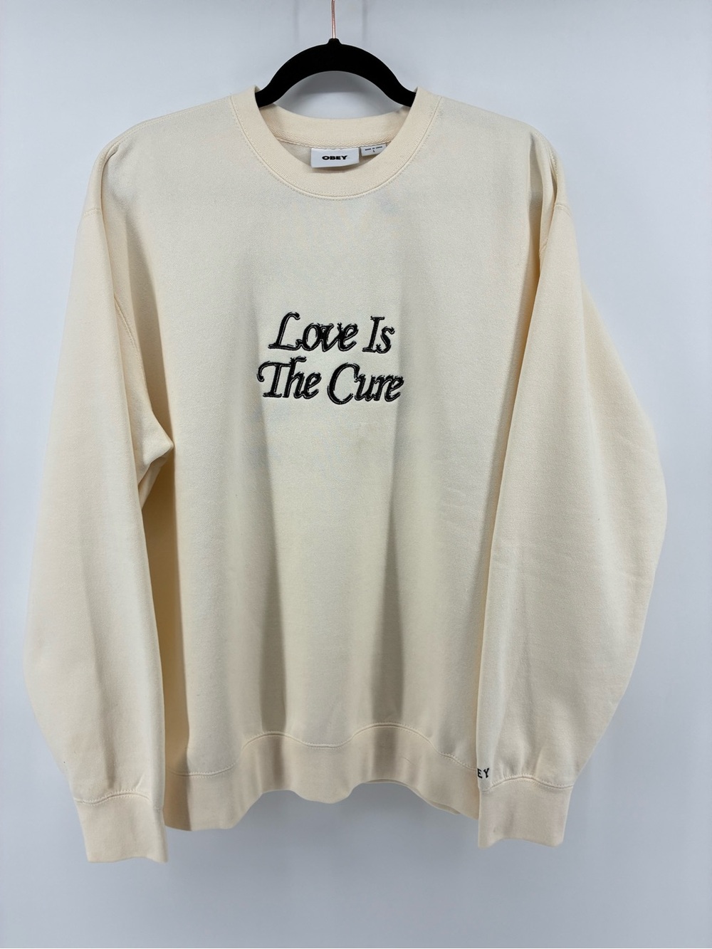 Obey Men’s Cream Crewneck Sweater with Embroidered 'Love Is The Cure'